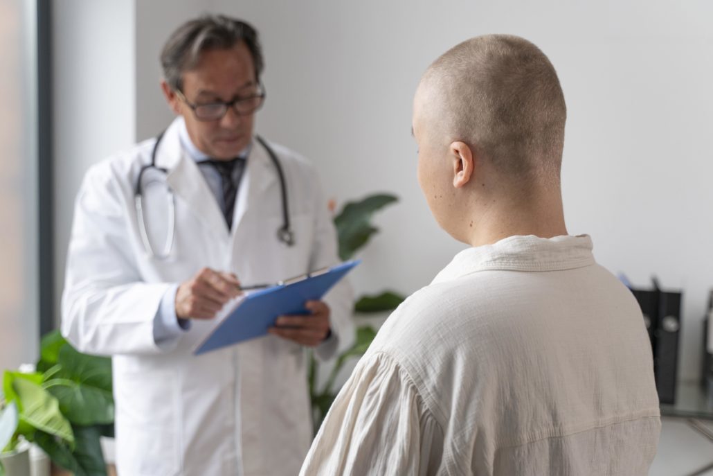 A male doctor and a bald male patient