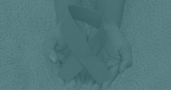 Cervical cancer ribbon on teal