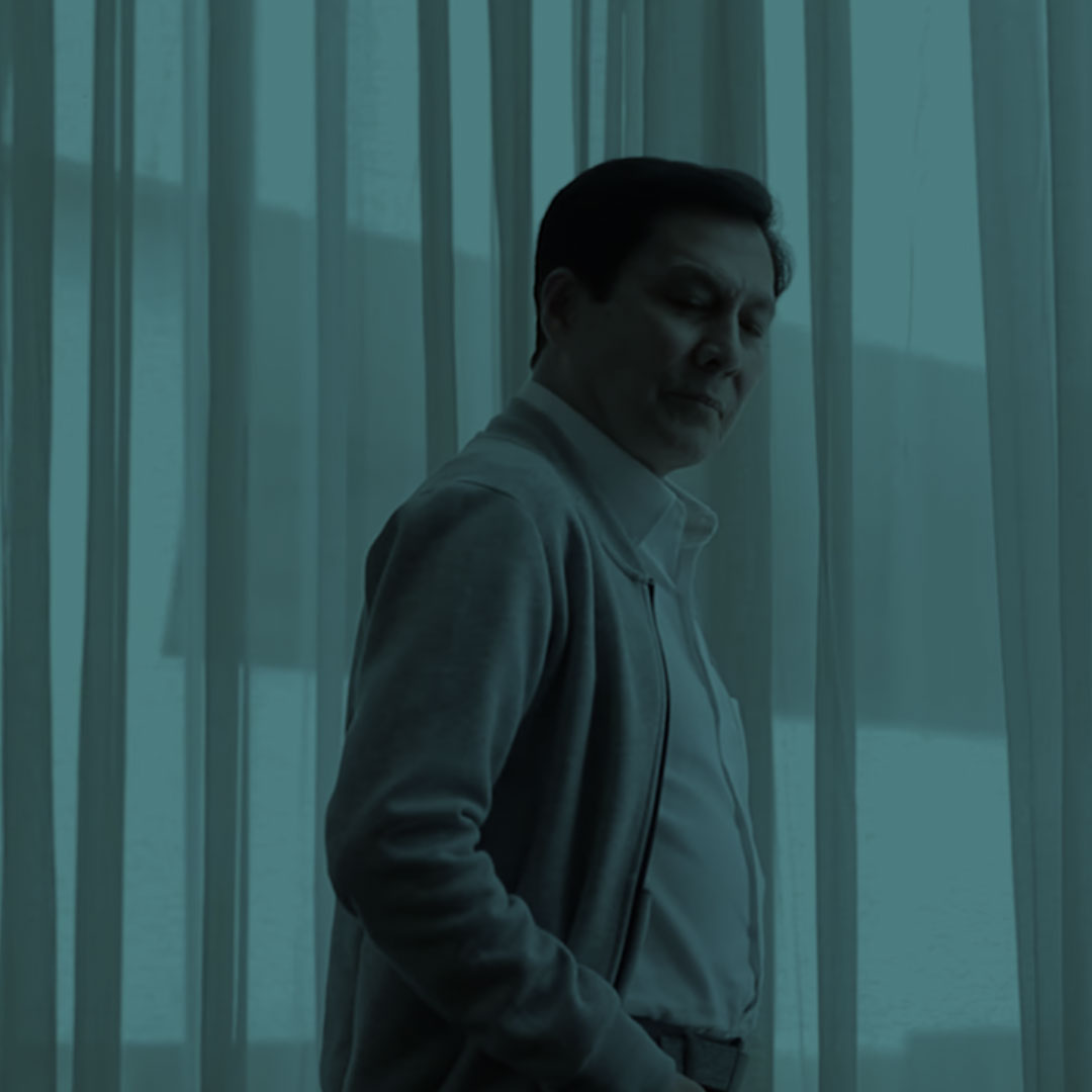 Tirso Cruz in teal